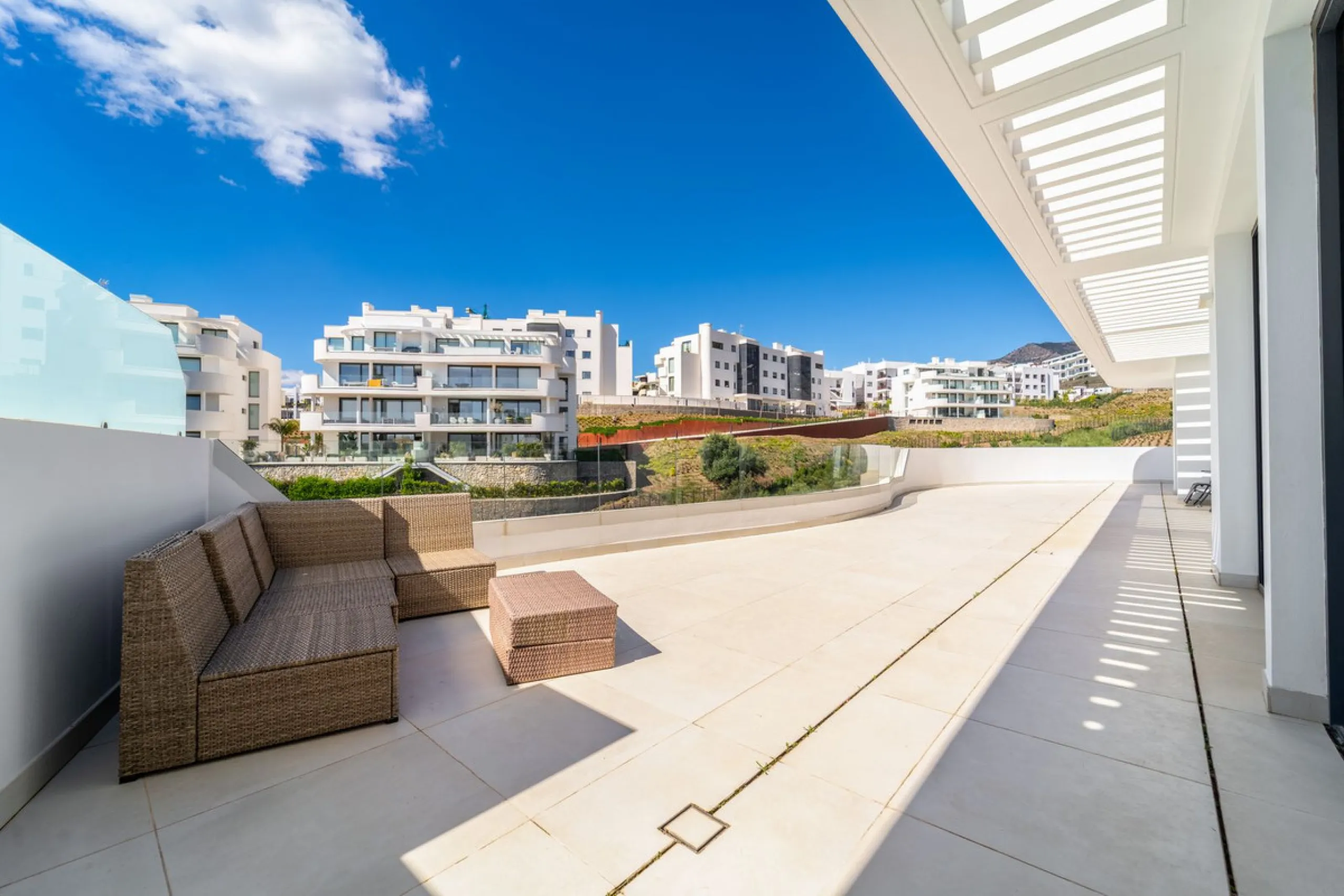 Luxury west facing penthouse, located in the exclusive urbanization of Higuerón West. Consists of entrance, hall way, spacious living-dining room with floor to ceiling glass sliding doors leading out to a large wrap around terrace of 158m2, with views of 