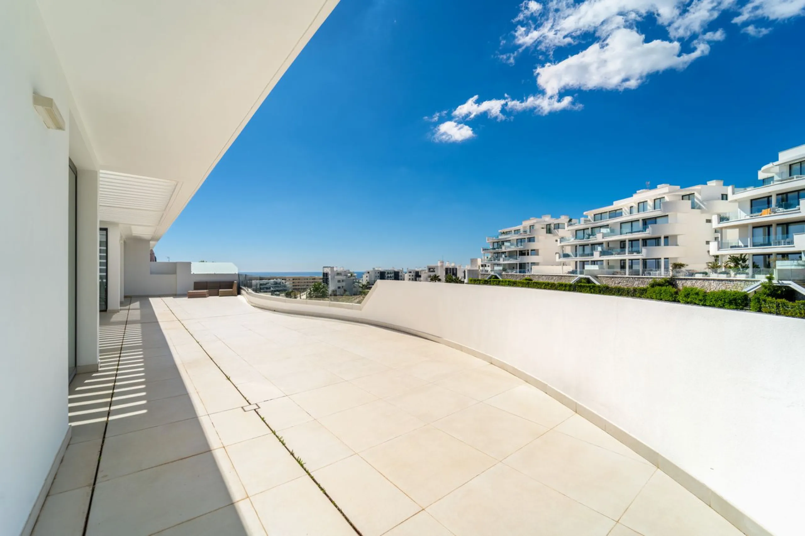 Luxury west facing penthouse, located in the exclusive urbanization of Higuerón West. Consists of entrance, hall way, spacious living-dining room with floor to ceiling glass sliding doors leading out to a large wrap around terrace of 158m2, with views of 