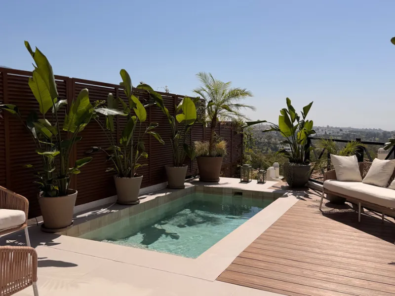 This exquisite 3-bedroom ground-floor apartment in Nueva Andalucía, Marbella, epitomizes modern luxury and comfort. Recently renovated to the highest standards, the property features an open-plan living and dining area, perfectly designed for seamless ent