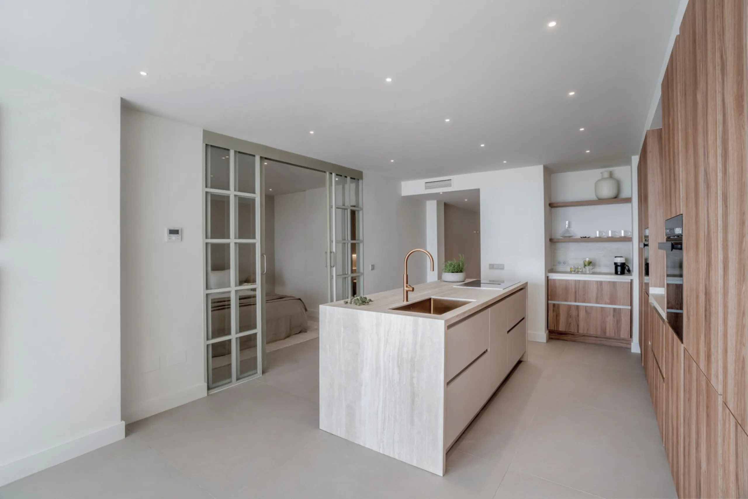 This exquisite 3-bedroom ground-floor apartment in Nueva Andalucía, Marbella, epitomizes modern luxury and comfort. Recently renovated to the highest standards, the property features an open-plan living and dining area, perfectly designed for seamless ent