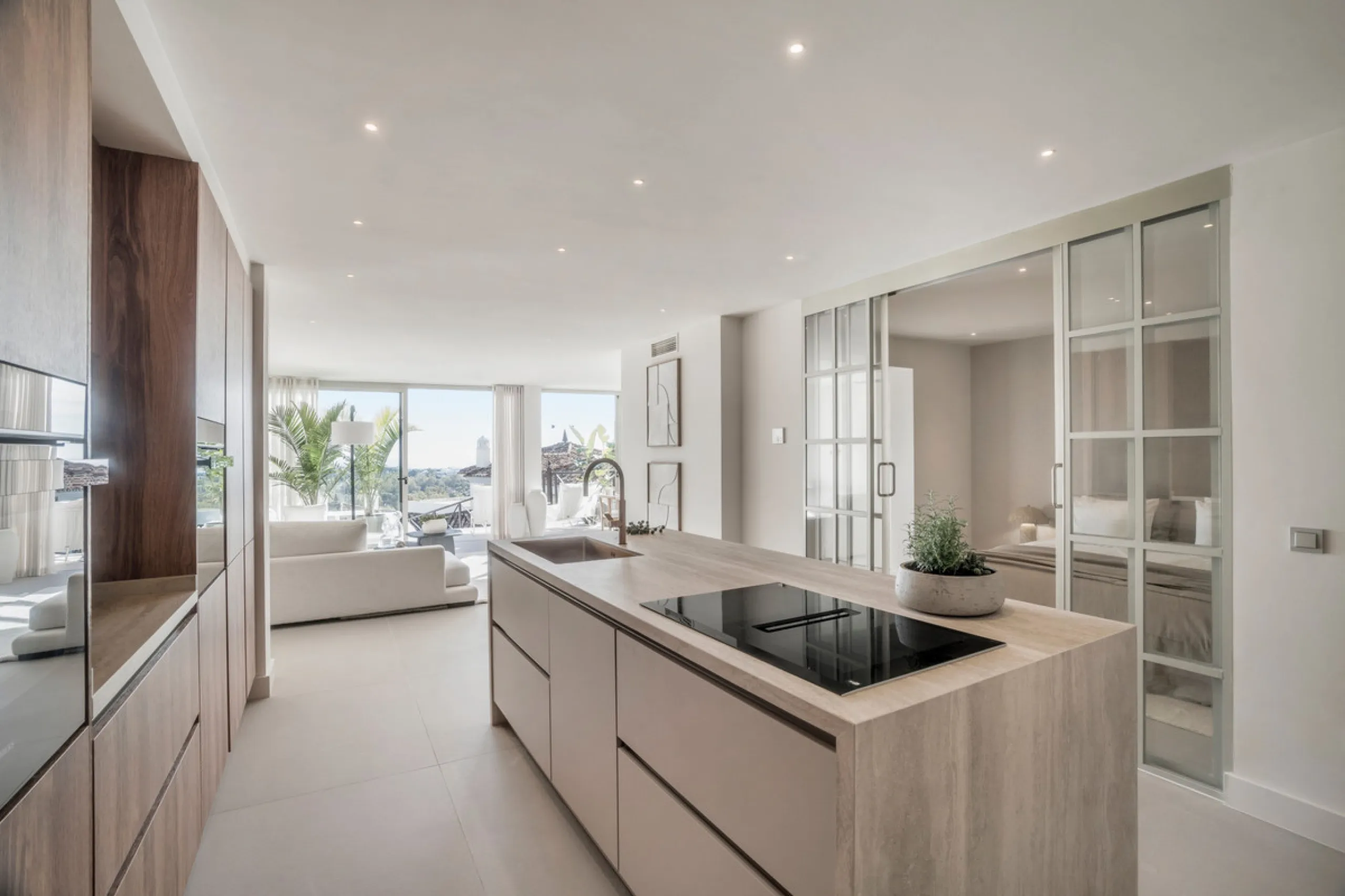 This exquisite 3-bedroom ground-floor apartment in Nueva Andalucía, Marbella, epitomizes modern luxury and comfort. Recently renovated to the highest standards, the property features an open-plan living and dining area, perfectly designed for seamless ent