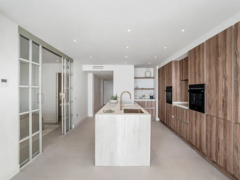 This exquisite 3-bedroom ground-floor apartment in Nueva Andalucía, Marbella, epitomizes modern luxury and comfort. Recently renovated to the highest standards, the property features an open-plan living and dining area, perfectly designed for seamless ent