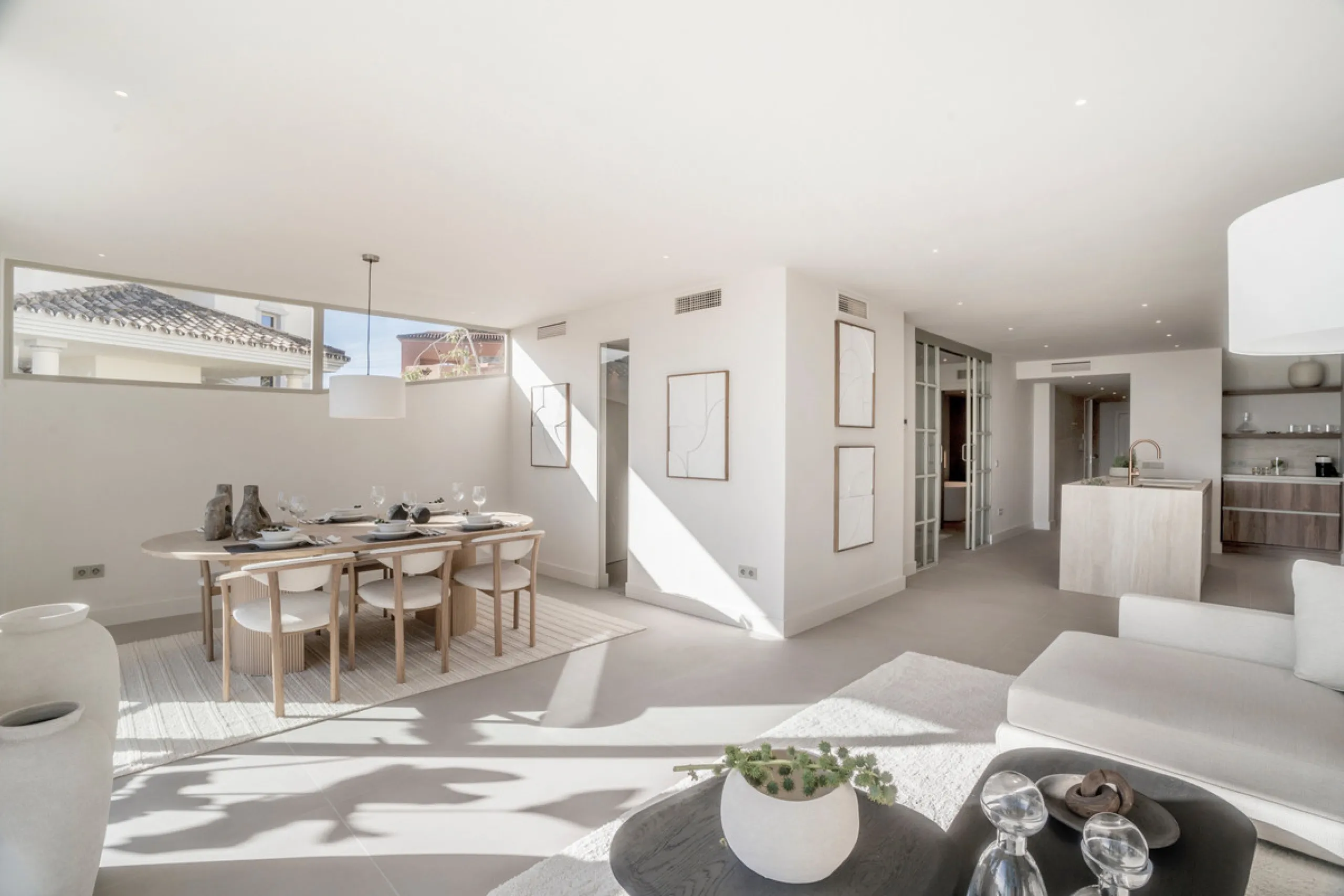 This exquisite 3-bedroom ground-floor apartment in Nueva Andalucía, Marbella, epitomizes modern luxury and comfort. Recently renovated to the highest standards, the property features an open-plan living and dining area, perfectly designed for seamless ent