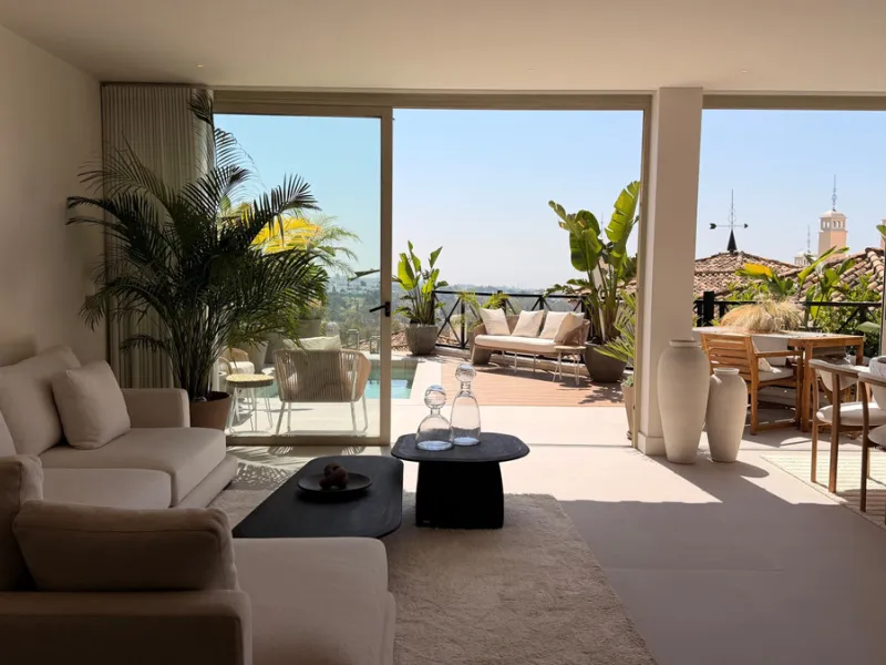 This exquisite 3-bedroom ground-floor apartment in Nueva Andalucía, Marbella, epitomizes modern luxury and comfort. Recently renovated to the highest standards, the property features an open-plan living and dining area, perfectly designed for seamless ent
