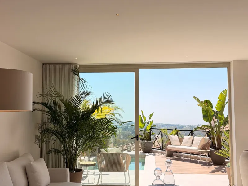 This exquisite 3-bedroom ground-floor apartment in Nueva Andalucía, Marbella, epitomizes modern luxury and comfort. Recently renovated to the highest standards, the property features an open-plan living and dining area, perfectly designed for seamless ent