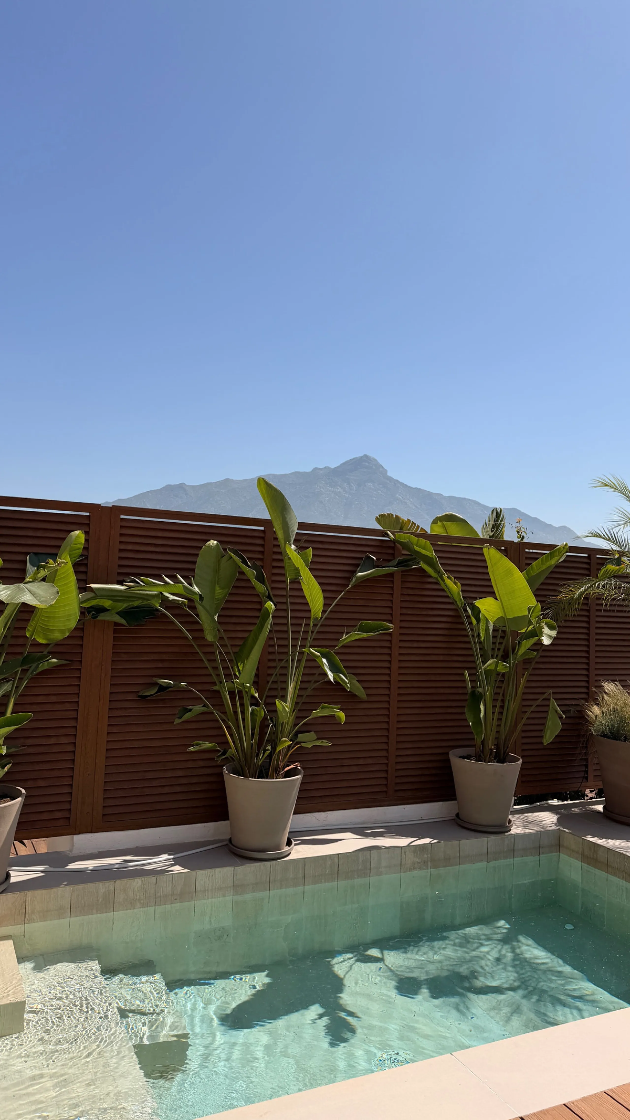 This exquisite 3-bedroom ground-floor apartment in Nueva Andalucía, Marbella, epitomizes modern luxury and comfort. Recently renovated to the highest standards, the property features an open-plan living and dining area, perfectly designed for seamless ent