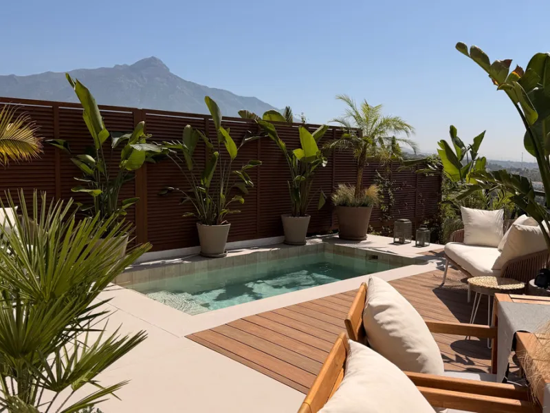 This exquisite 3-bedroom ground-floor apartment in Nueva Andalucía, Marbella, epitomizes modern luxury and comfort. Recently renovated to the highest standards, the property features an open-plan living and dining area, perfectly designed for seamless ent