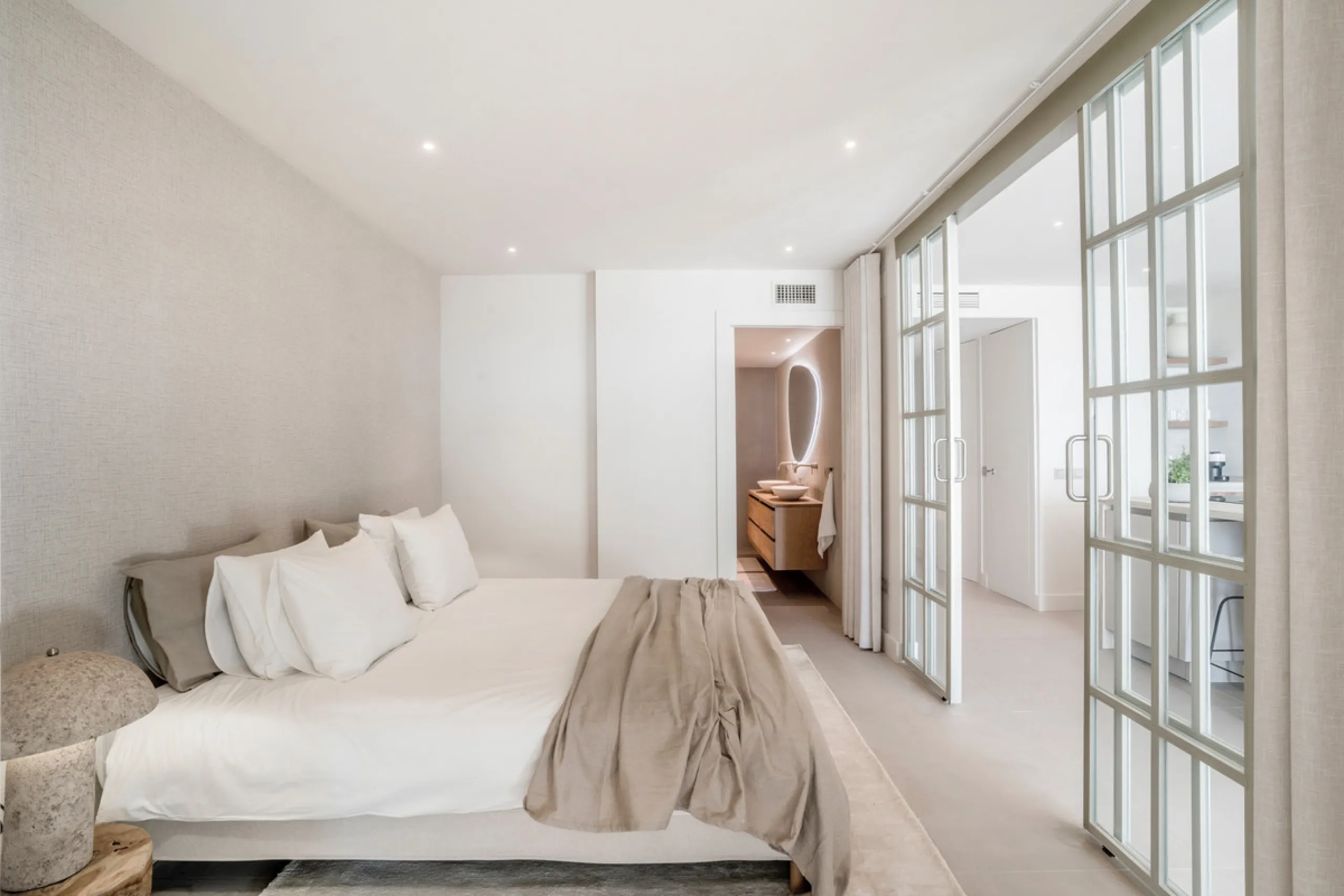 This exquisite 3-bedroom ground-floor apartment in Nueva Andalucía, Marbella, epitomizes modern luxury and comfort. Recently renovated to the highest standards, the property features an open-plan living and dining area, perfectly designed for seamless ent