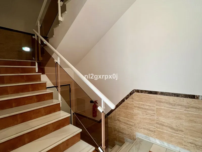Building composed of ground floor, first, second and third floors above and roof, distributed as follows: