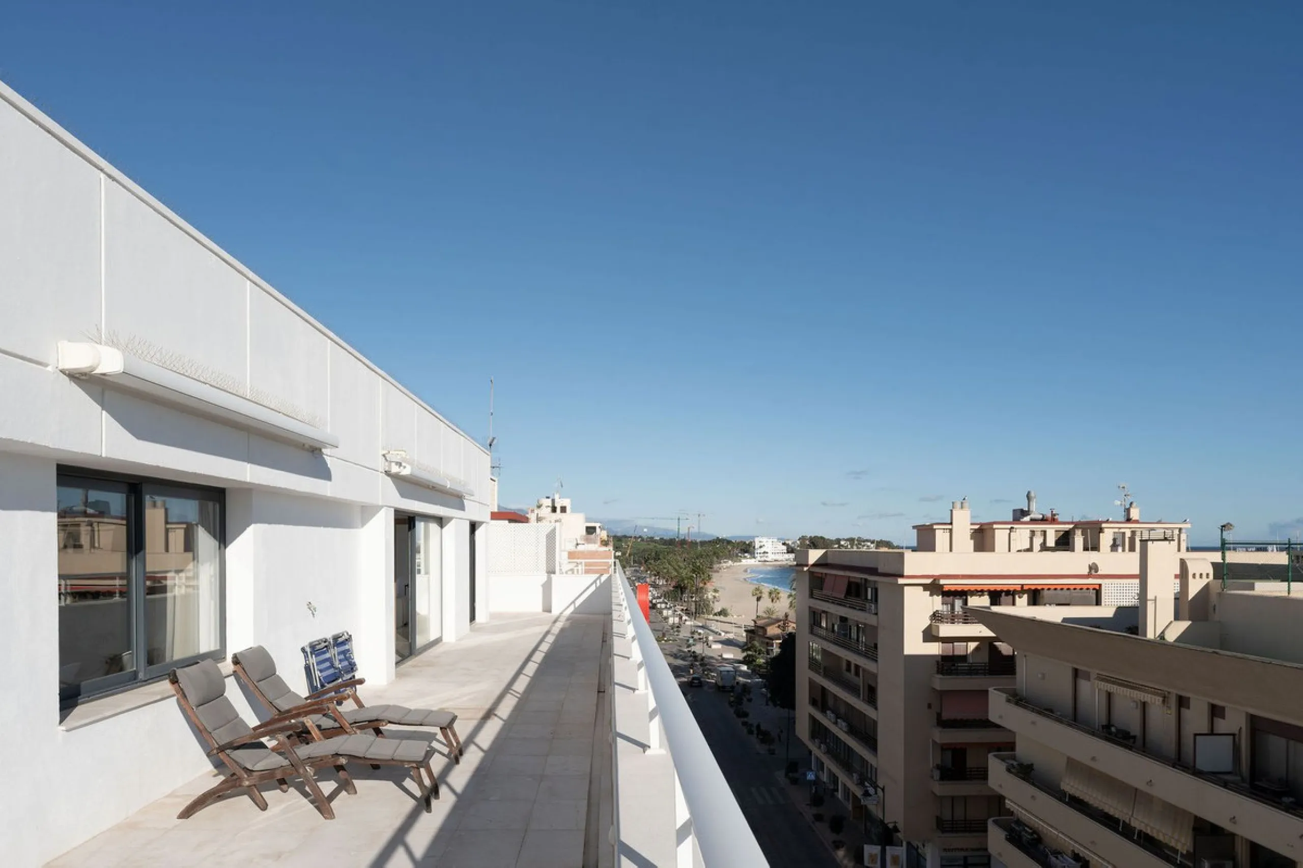 A very special penthouse situated 2nd line to the beach right in the centre of Estepona. The penthouse and terraces occupy the whole of the 6th floor on this building making it one of a kind and very private. The good size living and dining room have acce