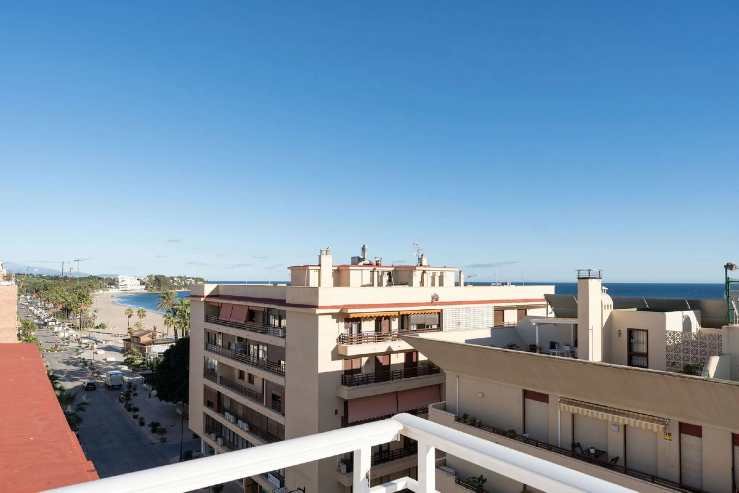 A very special penthouse situated 2nd line to the beach right in the centre of Estepona. The penthouse and terraces occupy the whole of the 6th floor on this building making it one of a kind and very private. The good size living and dining room have acce