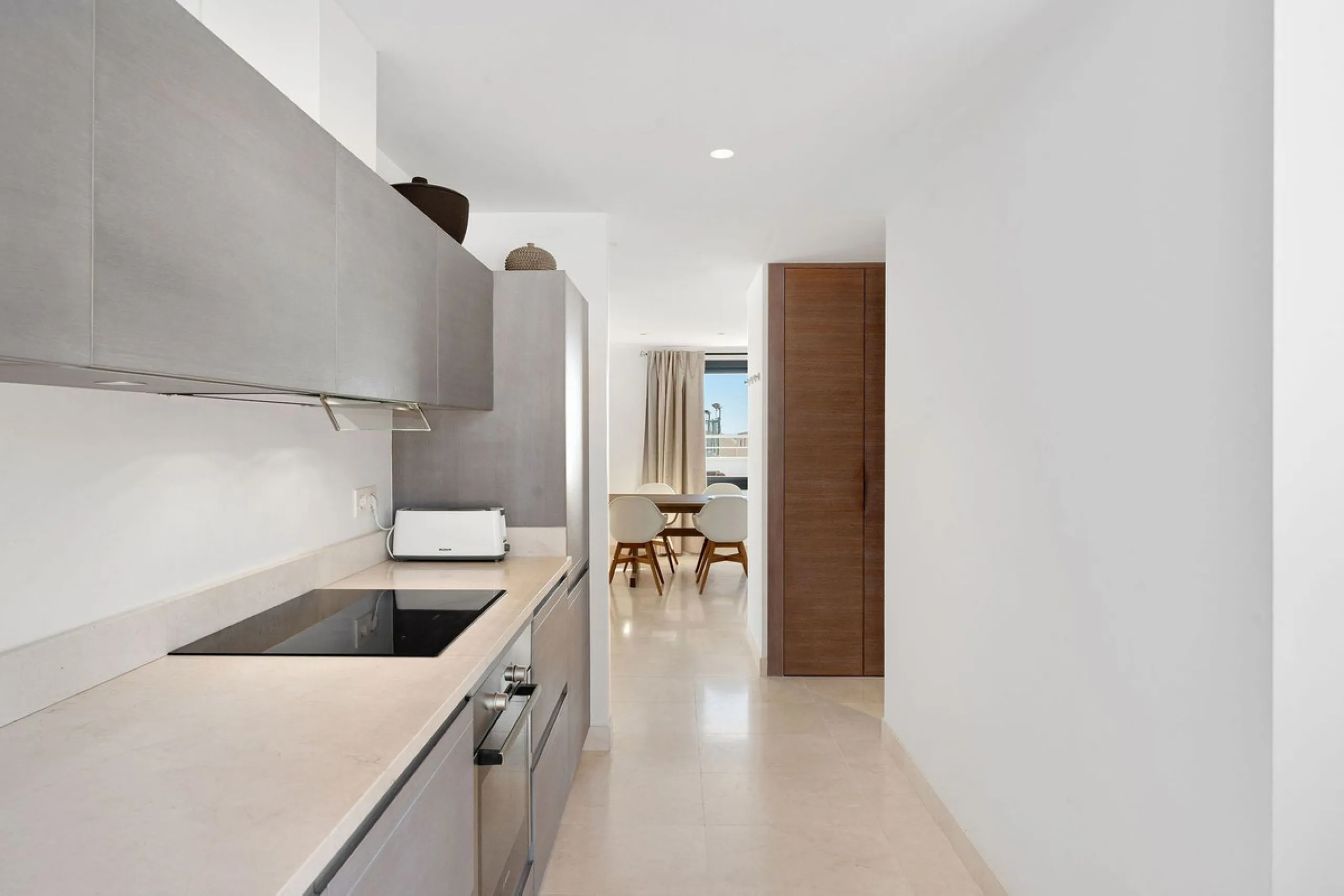 A very special penthouse situated 2nd line to the beach right in the centre of Estepona. The penthouse and terraces occupy the whole of the 6th floor on this building making it one of a kind and very private. The good size living and dining room have acce