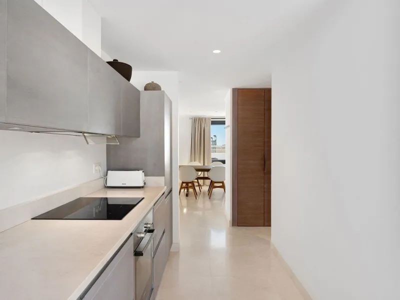 A very special penthouse situated 2nd line to the beach right in the centre of Estepona. The penthouse and terraces occupy the whole of the 6th floor on this building making it one of a kind and very private. The good size living and dining room have acce