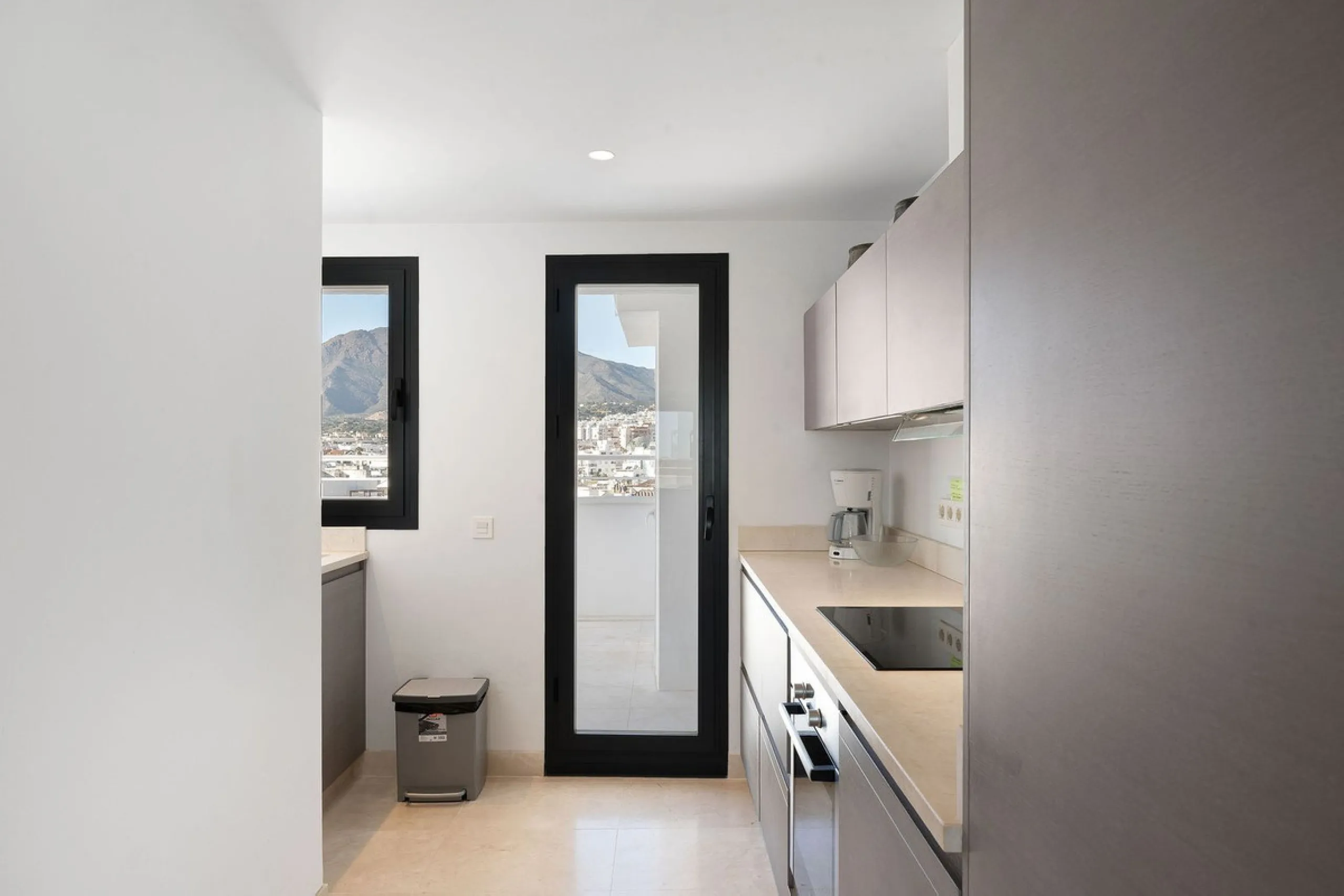 A very special penthouse situated 2nd line to the beach right in the centre of Estepona. The penthouse and terraces occupy the whole of the 6th floor on this building making it one of a kind and very private. The good size living and dining room have acce