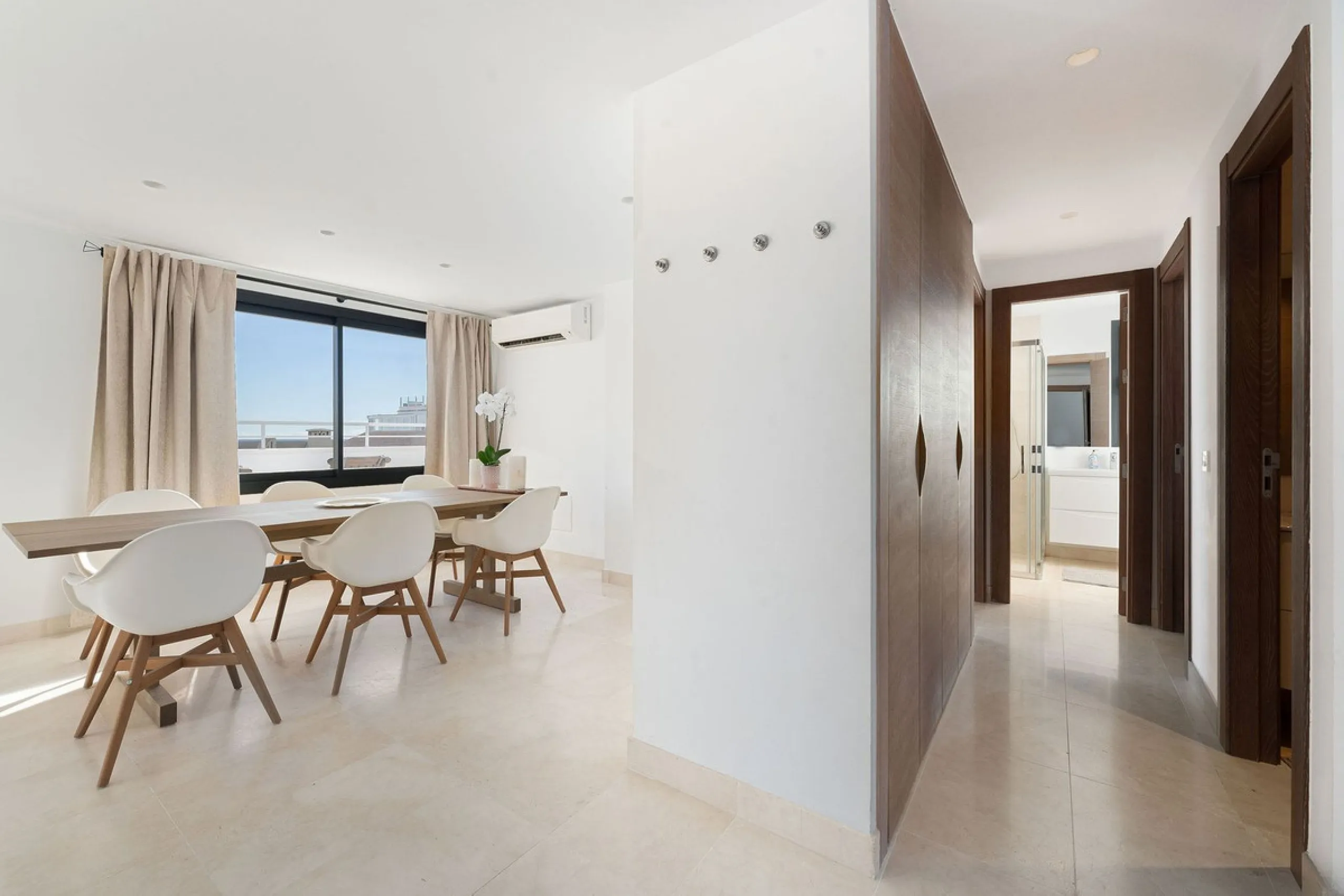 A very special penthouse situated 2nd line to the beach right in the centre of Estepona. The penthouse and terraces occupy the whole of the 6th floor on this building making it one of a kind and very private. The good size living and dining room have acce
