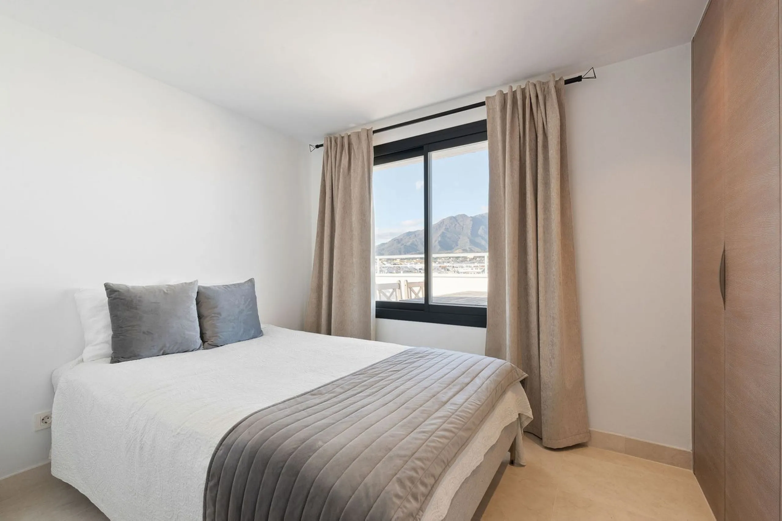A very special penthouse situated 2nd line to the beach right in the centre of Estepona. The penthouse and terraces occupy the whole of the 6th floor on this building making it one of a kind and very private. The good size living and dining room have acce