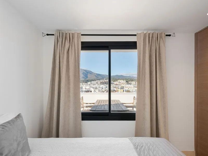 A very special penthouse situated 2nd line to the beach right in the centre of Estepona. The penthouse and terraces occupy the whole of the 6th floor on this building making it one of a kind and very private. The good size living and dining room have acce