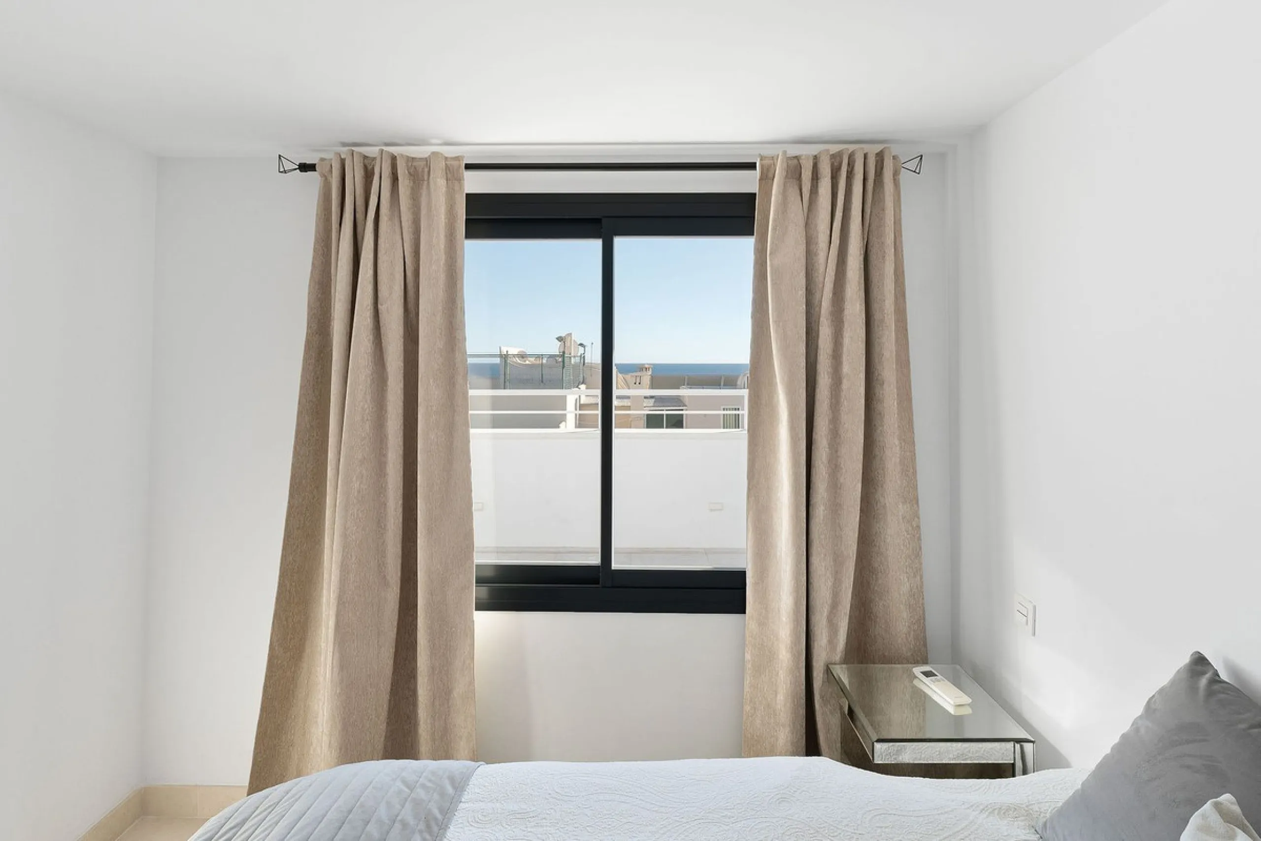 A very special penthouse situated 2nd line to the beach right in the centre of Estepona. The penthouse and terraces occupy the whole of the 6th floor on this building making it one of a kind and very private. The good size living and dining room have acce