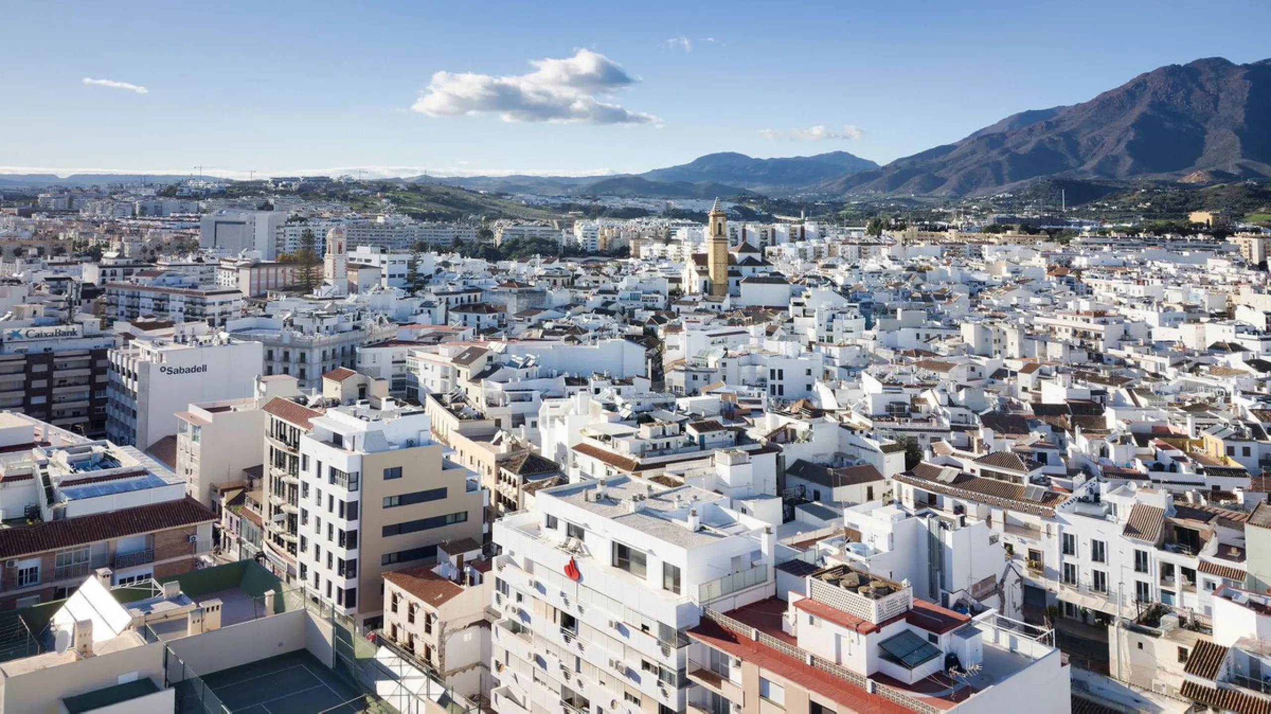 A very special penthouse situated 2nd line to the beach right in the centre of Estepona. The penthouse and terraces occupy the whole of the 6th floor on this building making it one of a kind and very private. The good size living and dining room have acce