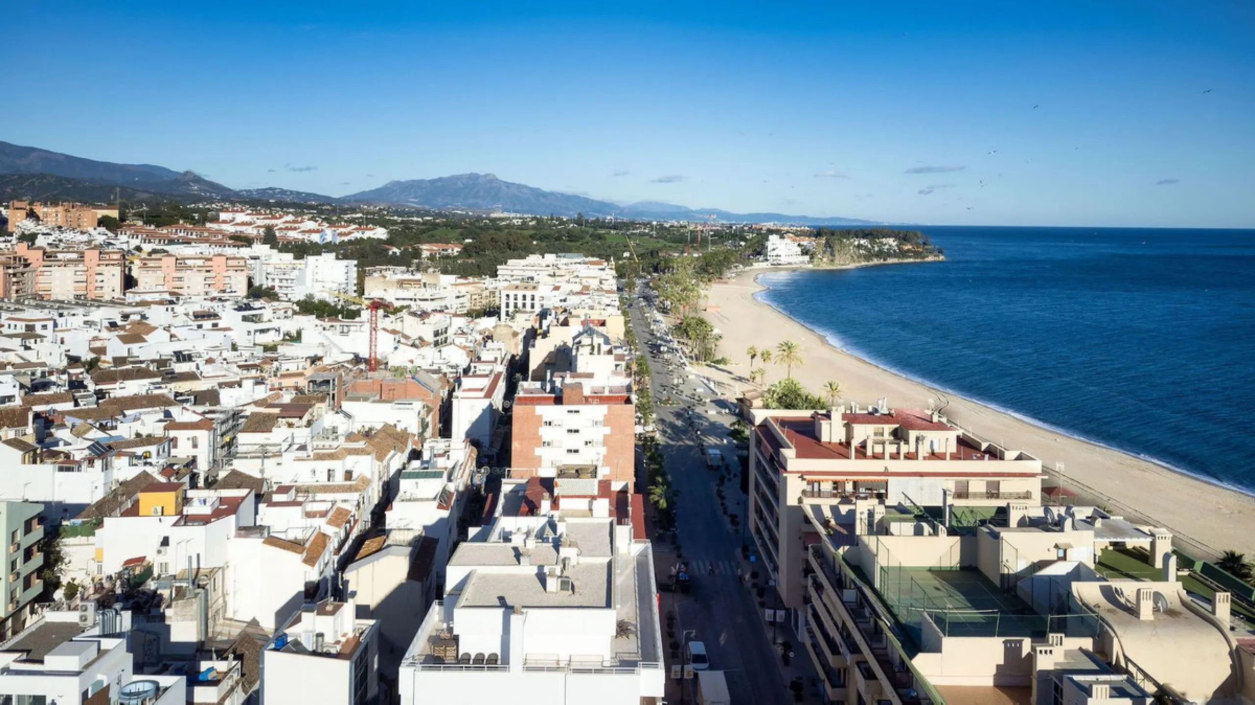 A very special penthouse situated 2nd line to the beach right in the centre of Estepona. The penthouse and terraces occupy the whole of the 6th floor on this building making it one of a kind and very private. The good size living and dining room have acce