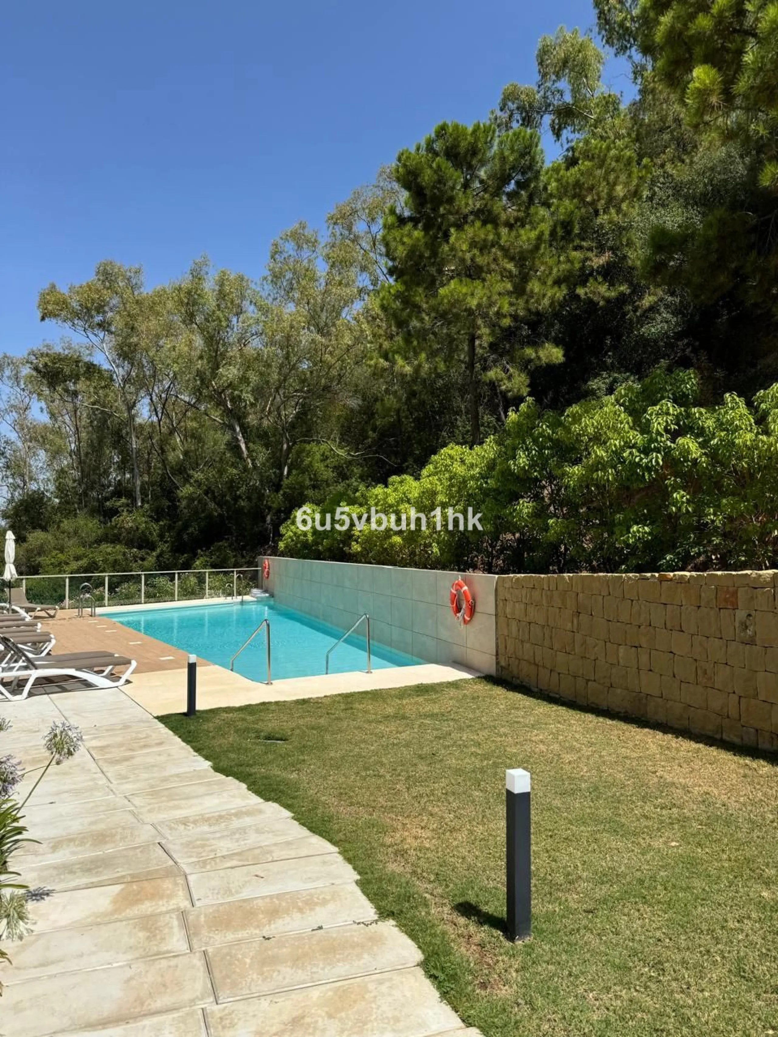 Nestled within an exclusive development of just 14 units, this stunning penthouse is situated alongside the renowned La Quinta Golf resort, celebrated for its exceptional golfing experience and prime location. Enjoy effortless access to nearby amenities, 