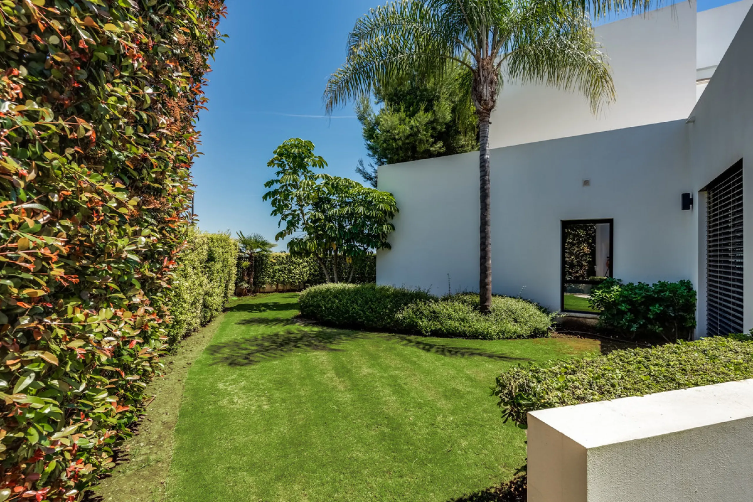This exceptional villa is nestled within an exclusive gated community in Marbella's prestigious Golden Mile. Set on a generous south-facing plot, the property is bathed in natural sunlight and enjoys breathtaking panoramic sea views from both floors, crea