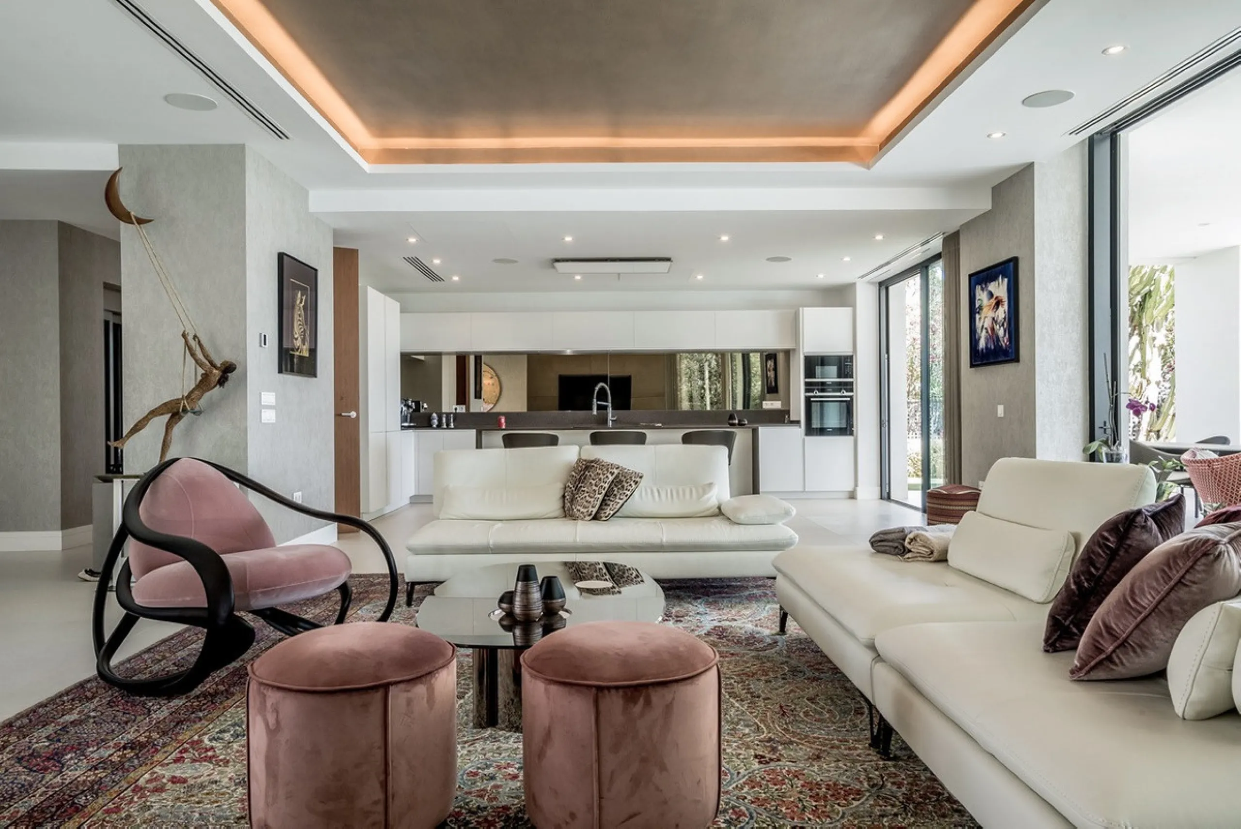 This exceptional villa is nestled within an exclusive gated community in Marbella's prestigious Golden Mile. Set on a generous south-facing plot, the property is bathed in natural sunlight and enjoys breathtaking panoramic sea views from both floors, crea