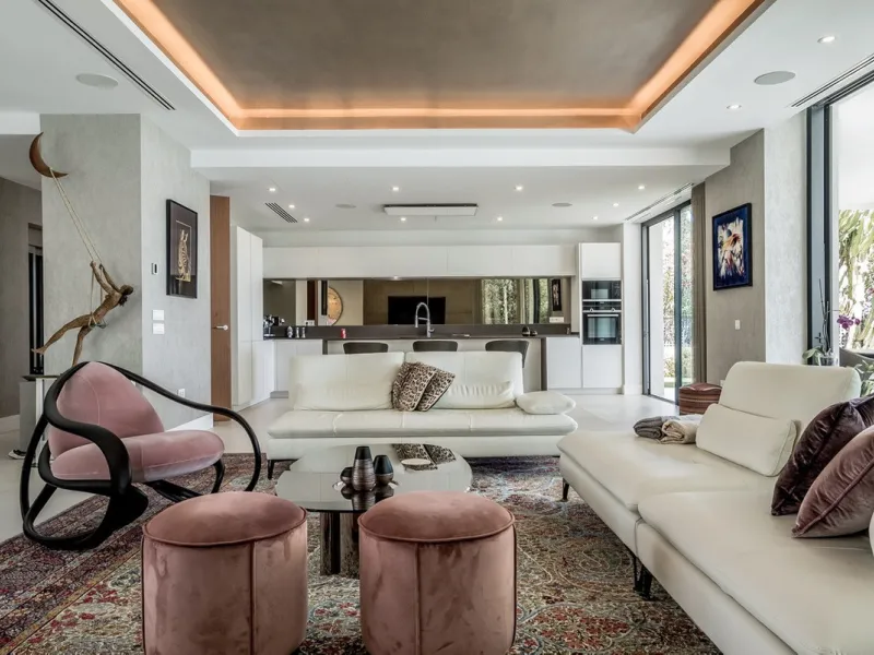 This exceptional villa is nestled within an exclusive gated community in Marbella's prestigious Golden Mile. Set on a generous south-facing plot, the property is bathed in natural sunlight and enjoys breathtaking panoramic sea views from both floors, crea