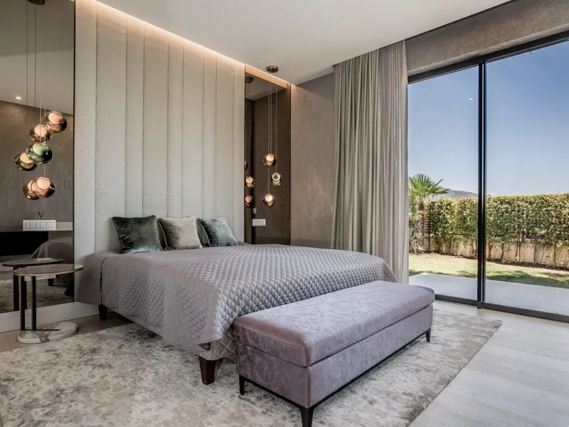 This exceptional villa is nestled within an exclusive gated community in Marbella's prestigious Golden Mile. Set on a generous south-facing plot, the property is bathed in natural sunlight and enjoys breathtaking panoramic sea views from both floors, crea