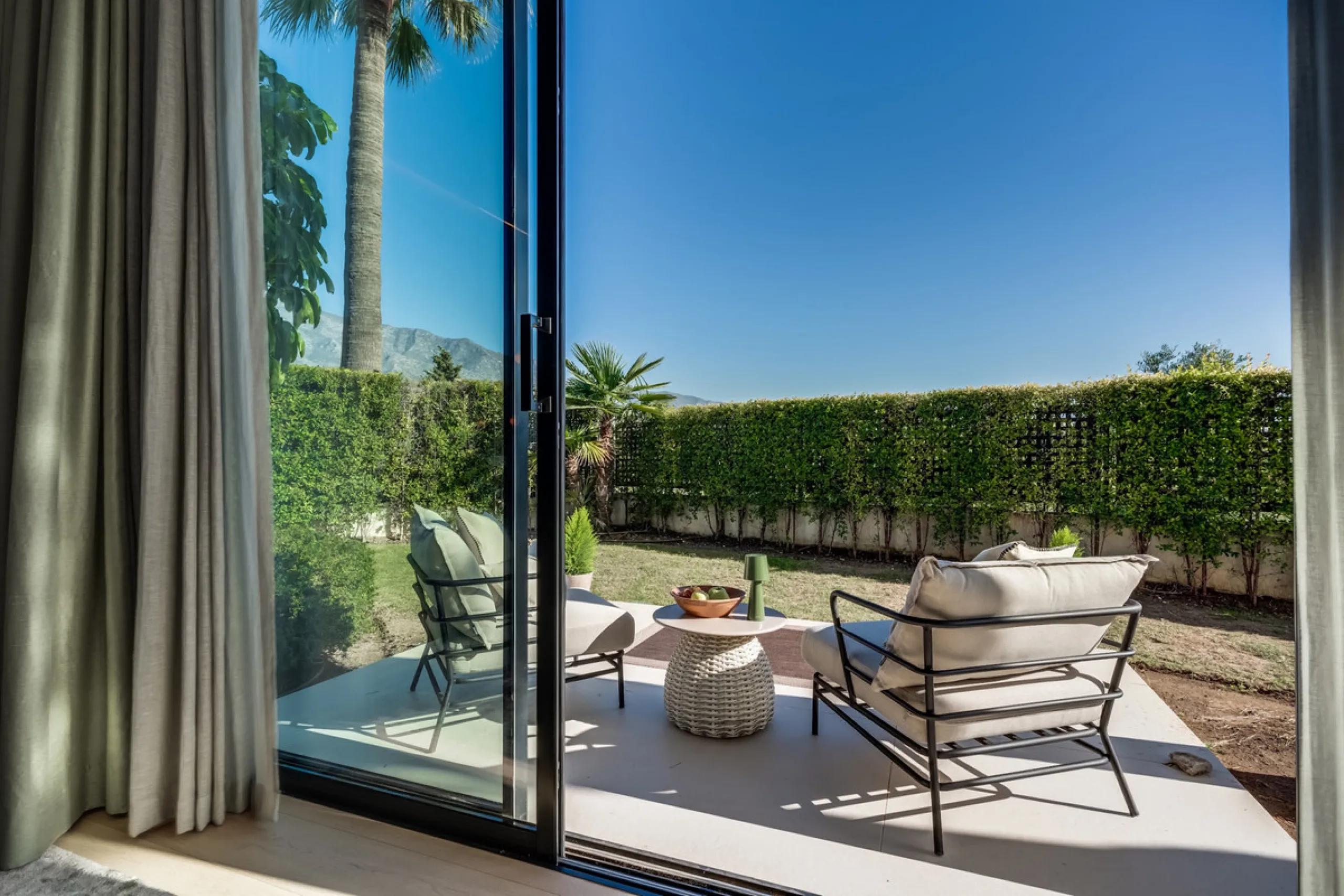 This exceptional villa is nestled within an exclusive gated community in Marbella's prestigious Golden Mile. Set on a generous south-facing plot, the property is bathed in natural sunlight and enjoys breathtaking panoramic sea views from both floors, crea