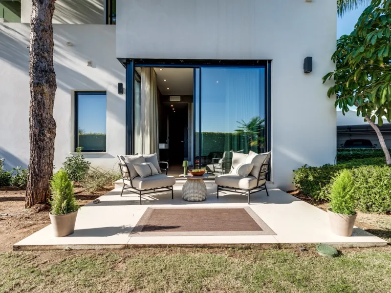 This exceptional villa is nestled within an exclusive gated community in Marbella's prestigious Golden Mile. Set on a generous south-facing plot, the property is bathed in natural sunlight and enjoys breathtaking panoramic sea views from both floors, crea
