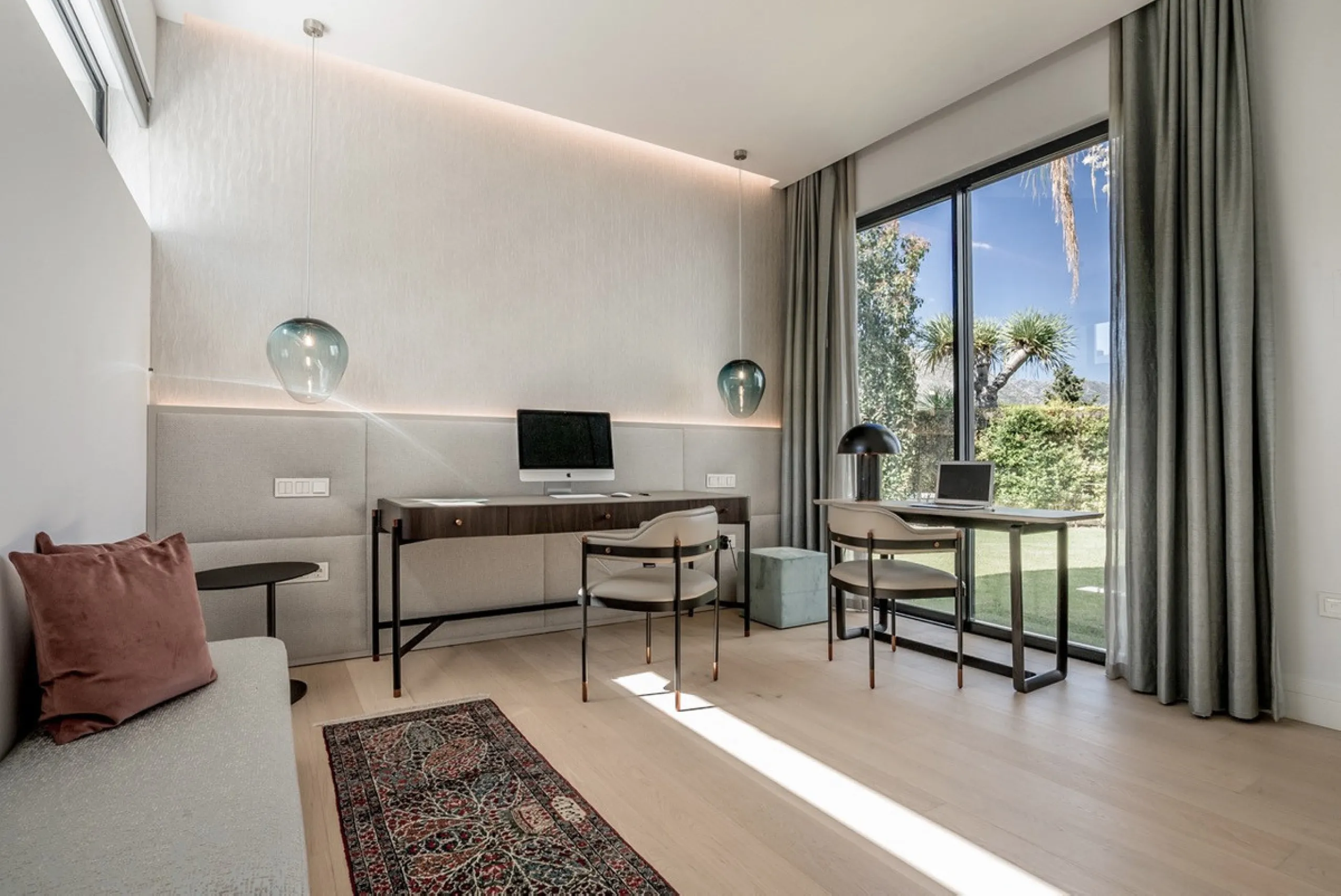 This exceptional villa is nestled within an exclusive gated community in Marbella's prestigious Golden Mile. Set on a generous south-facing plot, the property is bathed in natural sunlight and enjoys breathtaking panoramic sea views from both floors, crea