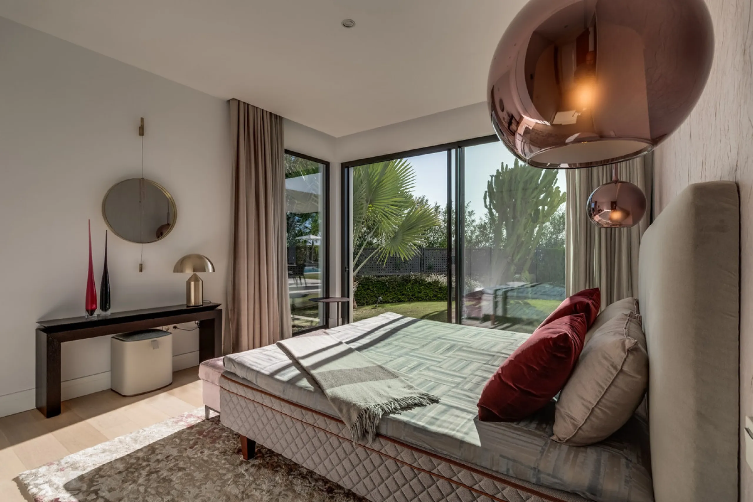 This exceptional villa is nestled within an exclusive gated community in Marbella's prestigious Golden Mile. Set on a generous south-facing plot, the property is bathed in natural sunlight and enjoys breathtaking panoramic sea views from both floors, crea