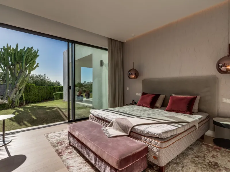 This exceptional villa is nestled within an exclusive gated community in Marbella's prestigious Golden Mile. Set on a generous south-facing plot, the property is bathed in natural sunlight and enjoys breathtaking panoramic sea views from both floors, crea