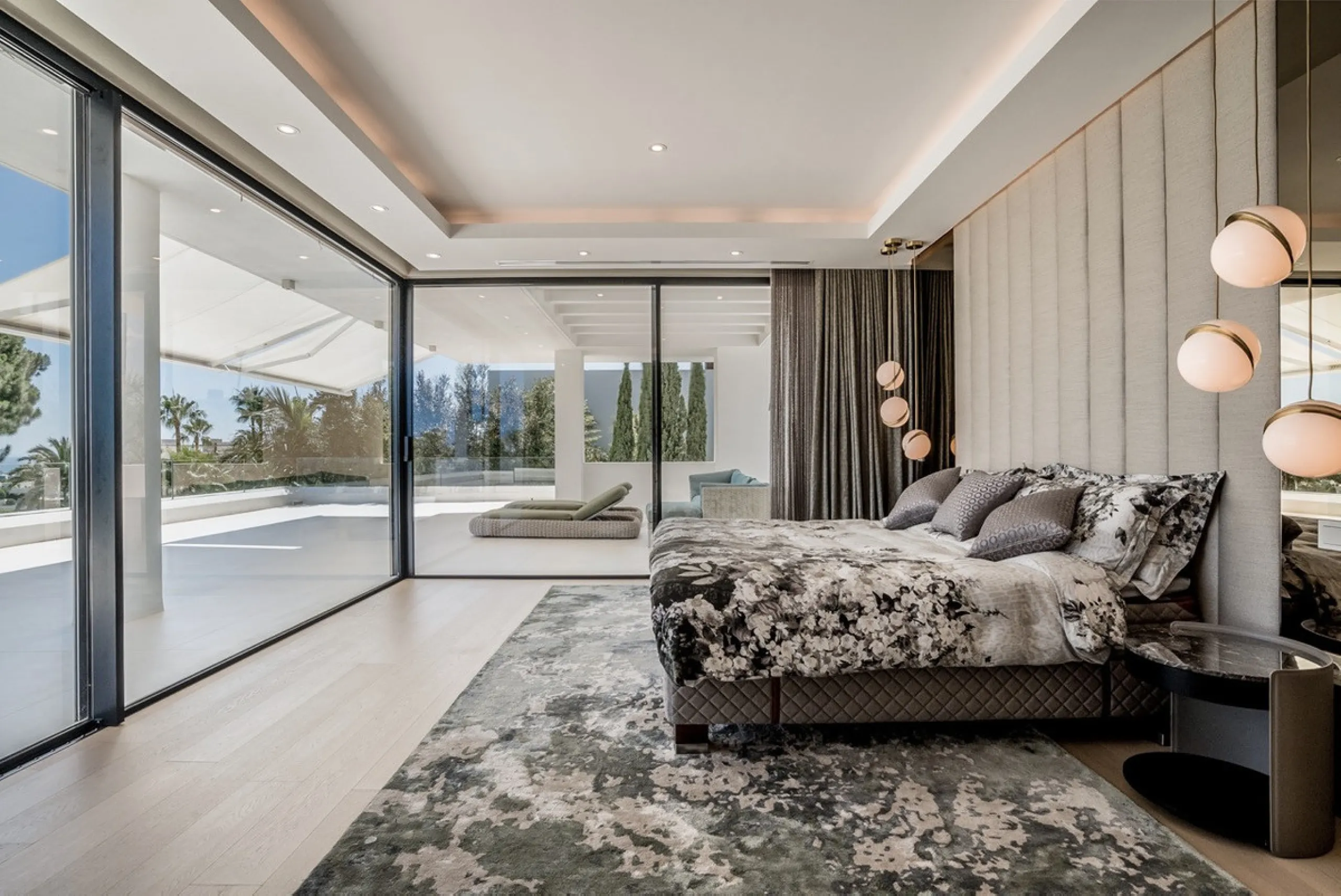 This exceptional villa is nestled within an exclusive gated community in Marbella's prestigious Golden Mile. Set on a generous south-facing plot, the property is bathed in natural sunlight and enjoys breathtaking panoramic sea views from both floors, crea
