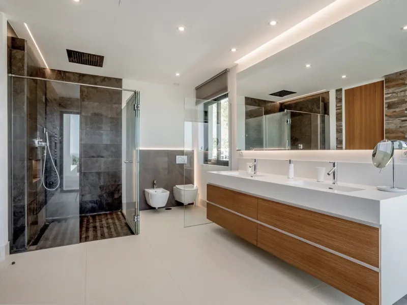 This exceptional villa is nestled within an exclusive gated community in Marbella's prestigious Golden Mile. Set on a generous south-facing plot, the property is bathed in natural sunlight and enjoys breathtaking panoramic sea views from both floors, crea