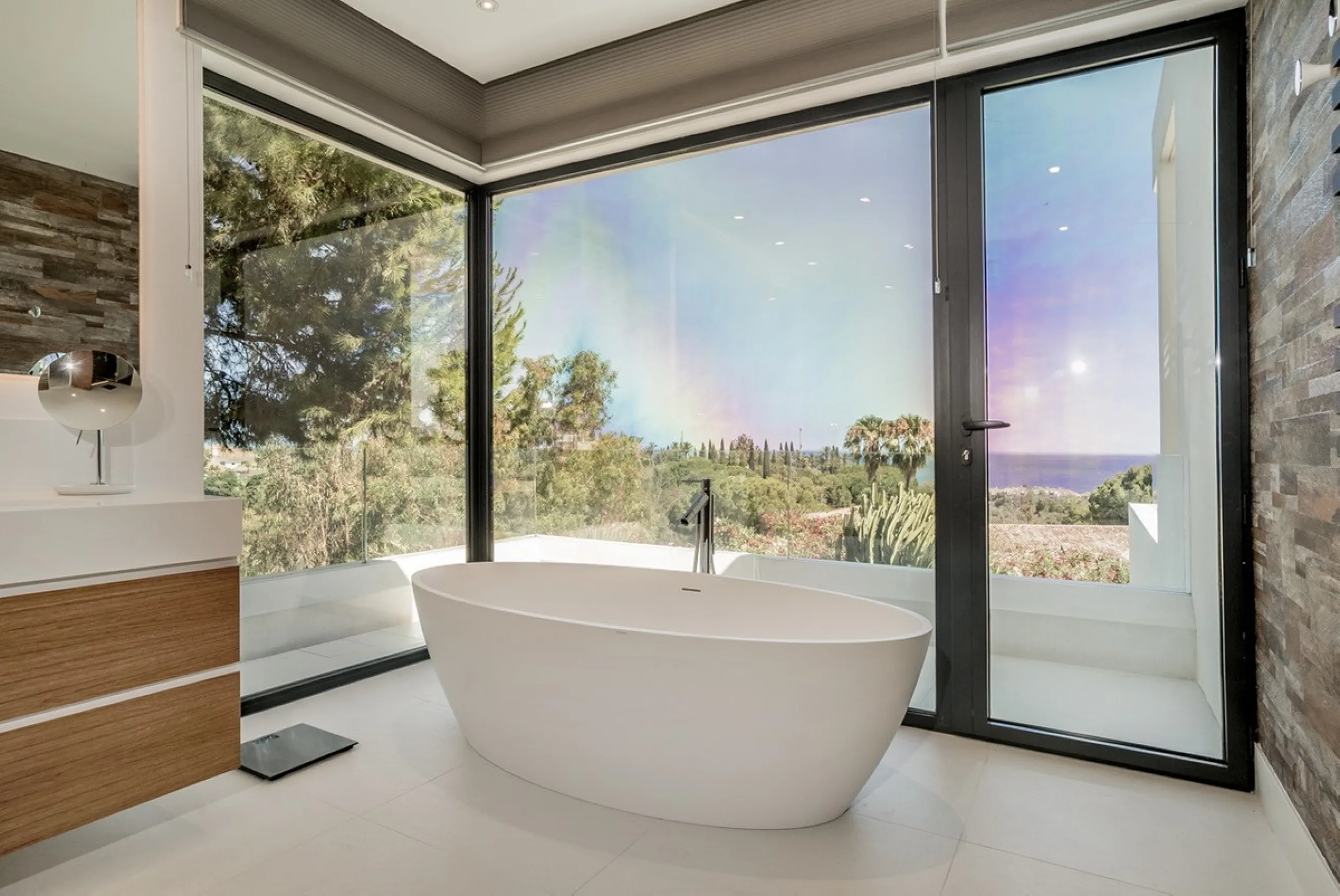This exceptional villa is nestled within an exclusive gated community in Marbella's prestigious Golden Mile. Set on a generous south-facing plot, the property is bathed in natural sunlight and enjoys breathtaking panoramic sea views from both floors, crea