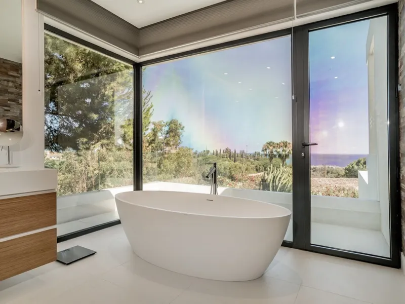 This exceptional villa is nestled within an exclusive gated community in Marbella's prestigious Golden Mile. Set on a generous south-facing plot, the property is bathed in natural sunlight and enjoys breathtaking panoramic sea views from both floors, crea