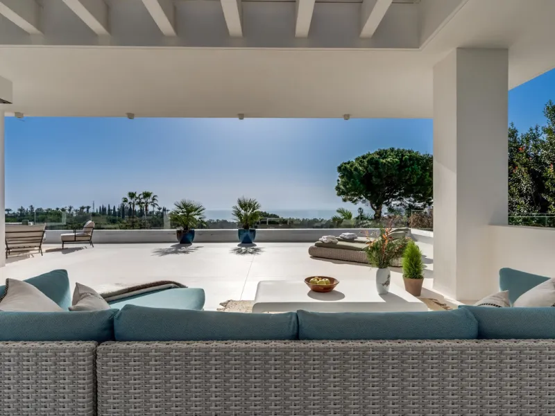 This exceptional villa is nestled within an exclusive gated community in Marbella's prestigious Golden Mile. Set on a generous south-facing plot, the property is bathed in natural sunlight and enjoys breathtaking panoramic sea views from both floors, crea