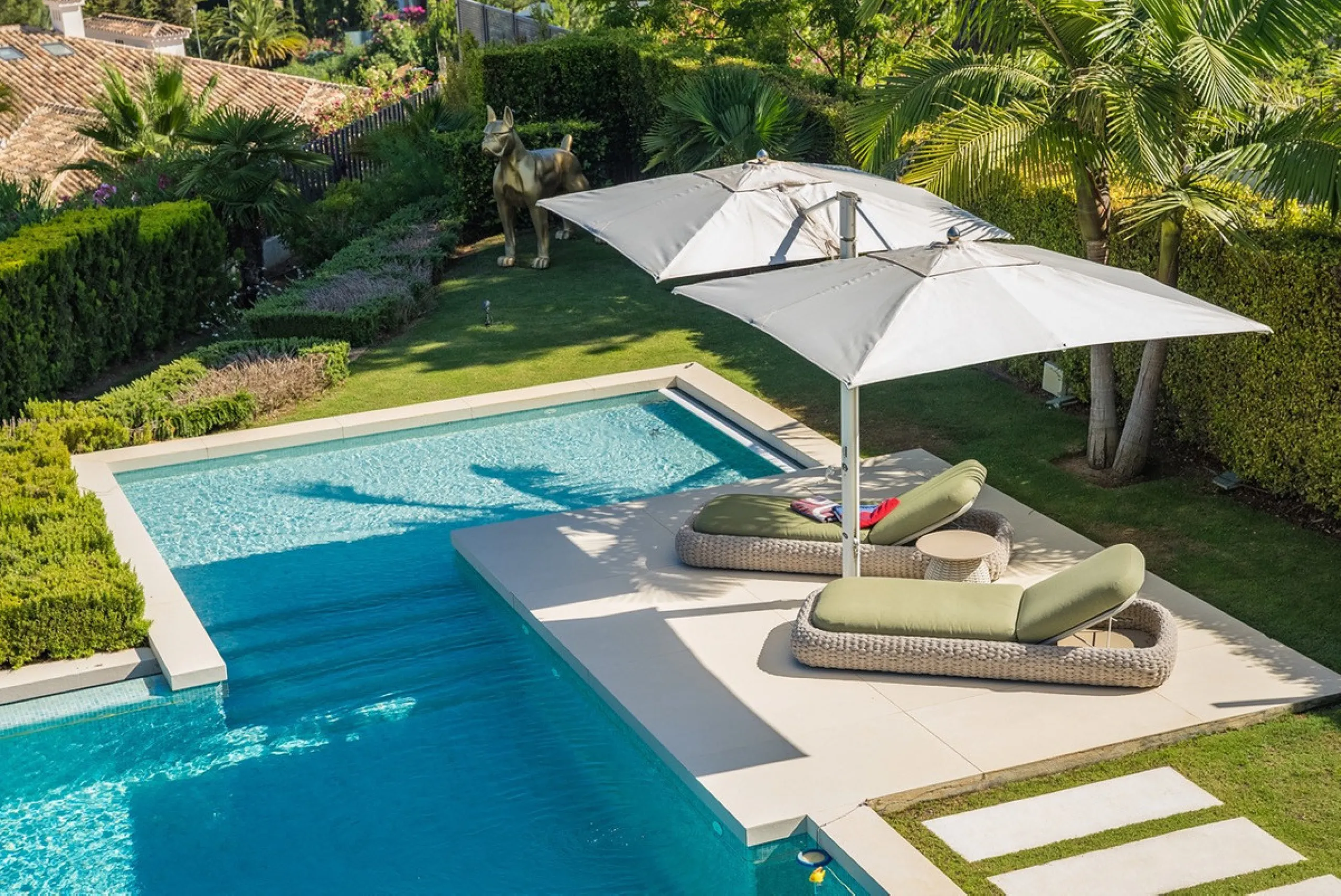 This exceptional villa is nestled within an exclusive gated community in Marbella's prestigious Golden Mile. Set on a generous south-facing plot, the property is bathed in natural sunlight and enjoys breathtaking panoramic sea views from both floors, crea