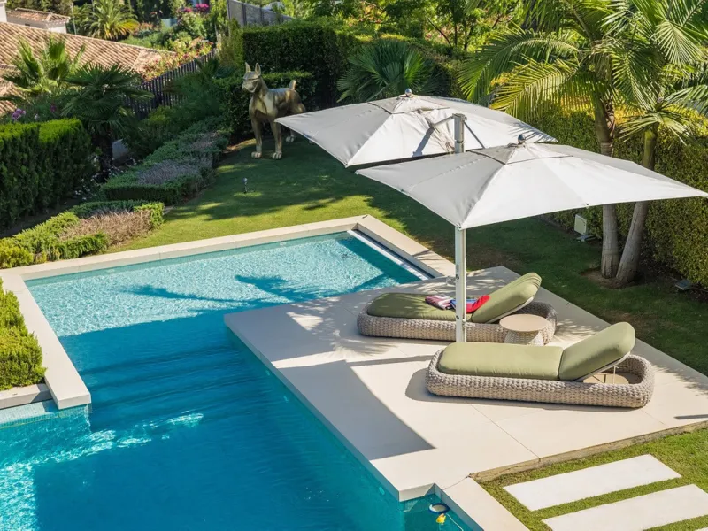 This exceptional villa is nestled within an exclusive gated community in Marbella's prestigious Golden Mile. Set on a generous south-facing plot, the property is bathed in natural sunlight and enjoys breathtaking panoramic sea views from both floors, crea
