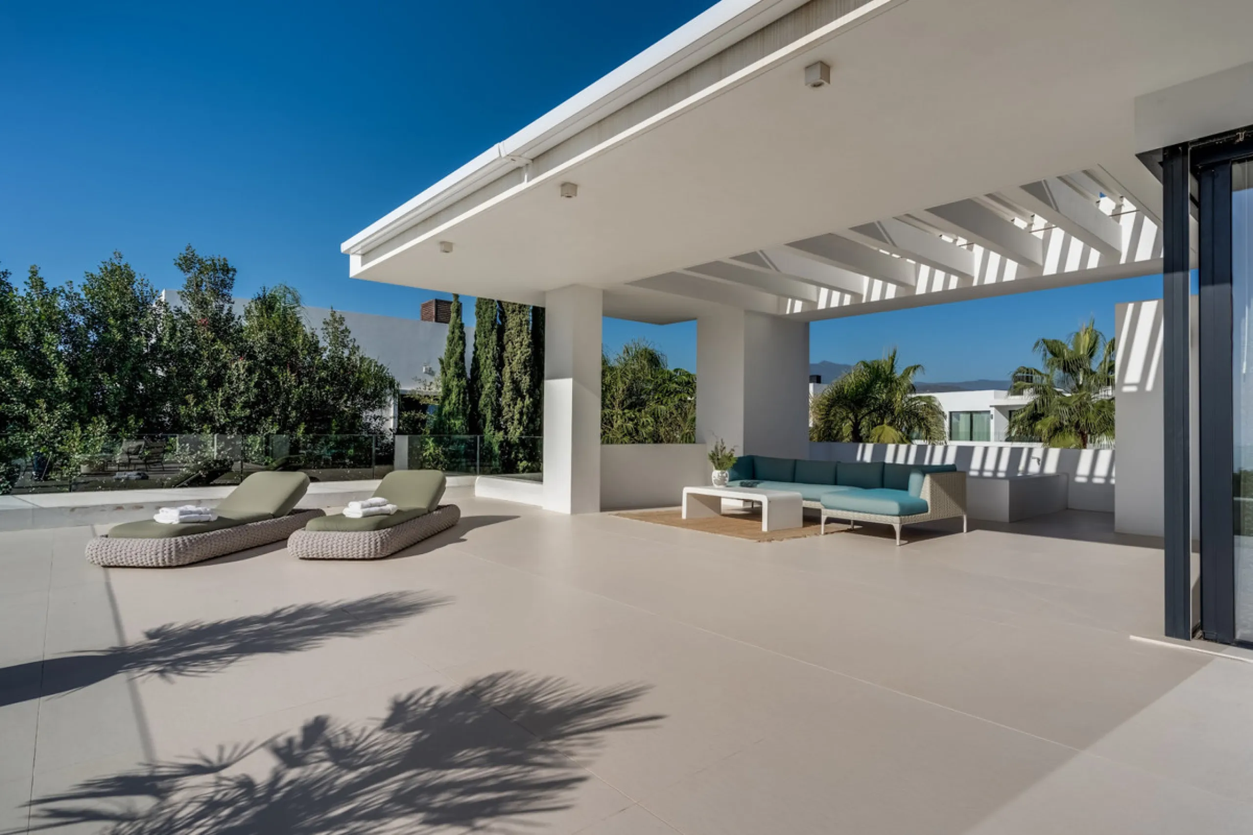 This exceptional villa is nestled within an exclusive gated community in Marbella's prestigious Golden Mile. Set on a generous south-facing plot, the property is bathed in natural sunlight and enjoys breathtaking panoramic sea views from both floors, crea