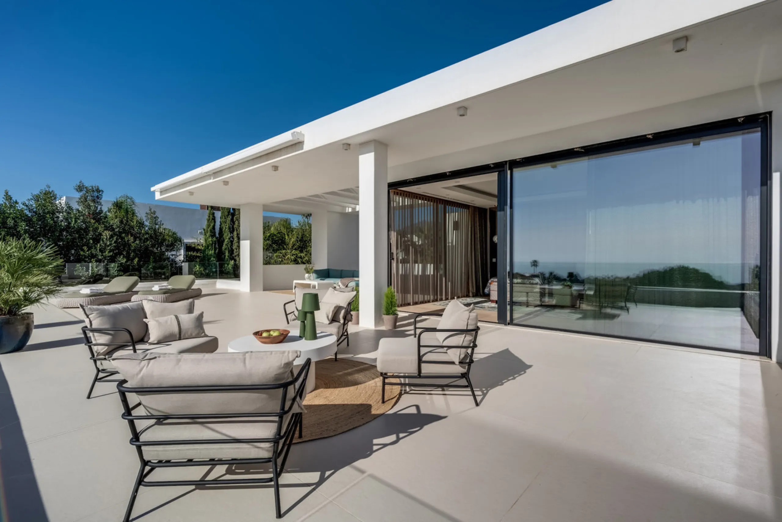 This exceptional villa is nestled within an exclusive gated community in Marbella's prestigious Golden Mile. Set on a generous south-facing plot, the property is bathed in natural sunlight and enjoys breathtaking panoramic sea views from both floors, crea