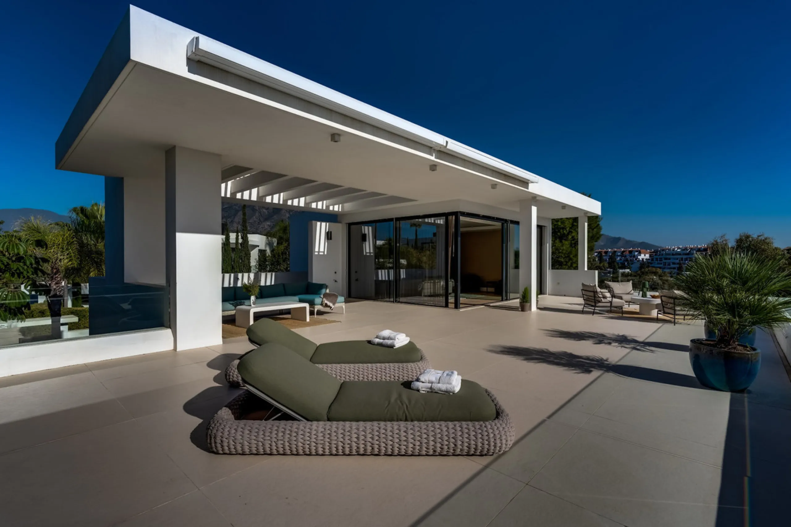 This exceptional villa is nestled within an exclusive gated community in Marbella's prestigious Golden Mile. Set on a generous south-facing plot, the property is bathed in natural sunlight and enjoys breathtaking panoramic sea views from both floors, crea