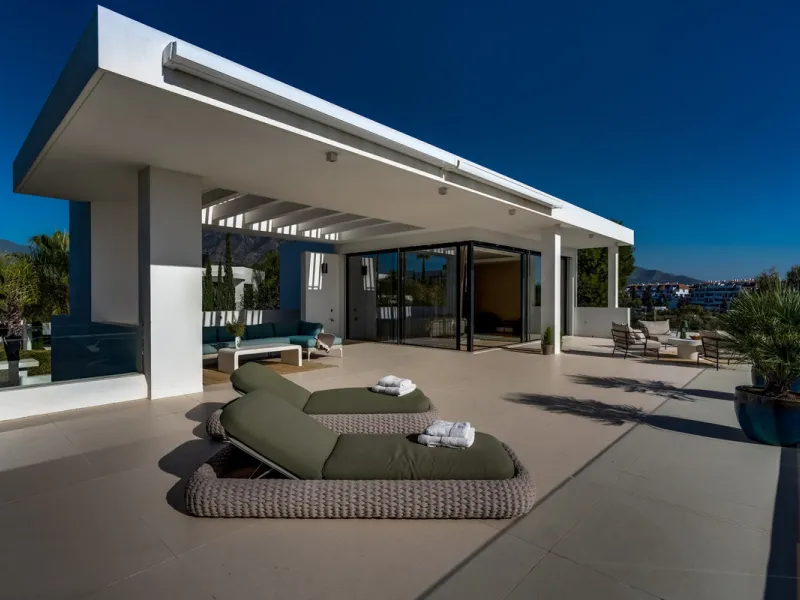 This exceptional villa is nestled within an exclusive gated community in Marbella's prestigious Golden Mile. Set on a generous south-facing plot, the property is bathed in natural sunlight and enjoys breathtaking panoramic sea views from both floors, crea