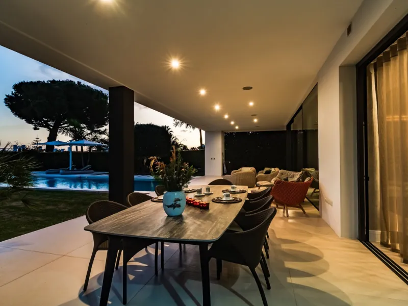 This exceptional villa is nestled within an exclusive gated community in Marbella's prestigious Golden Mile. Set on a generous south-facing plot, the property is bathed in natural sunlight and enjoys breathtaking panoramic sea views from both floors, crea