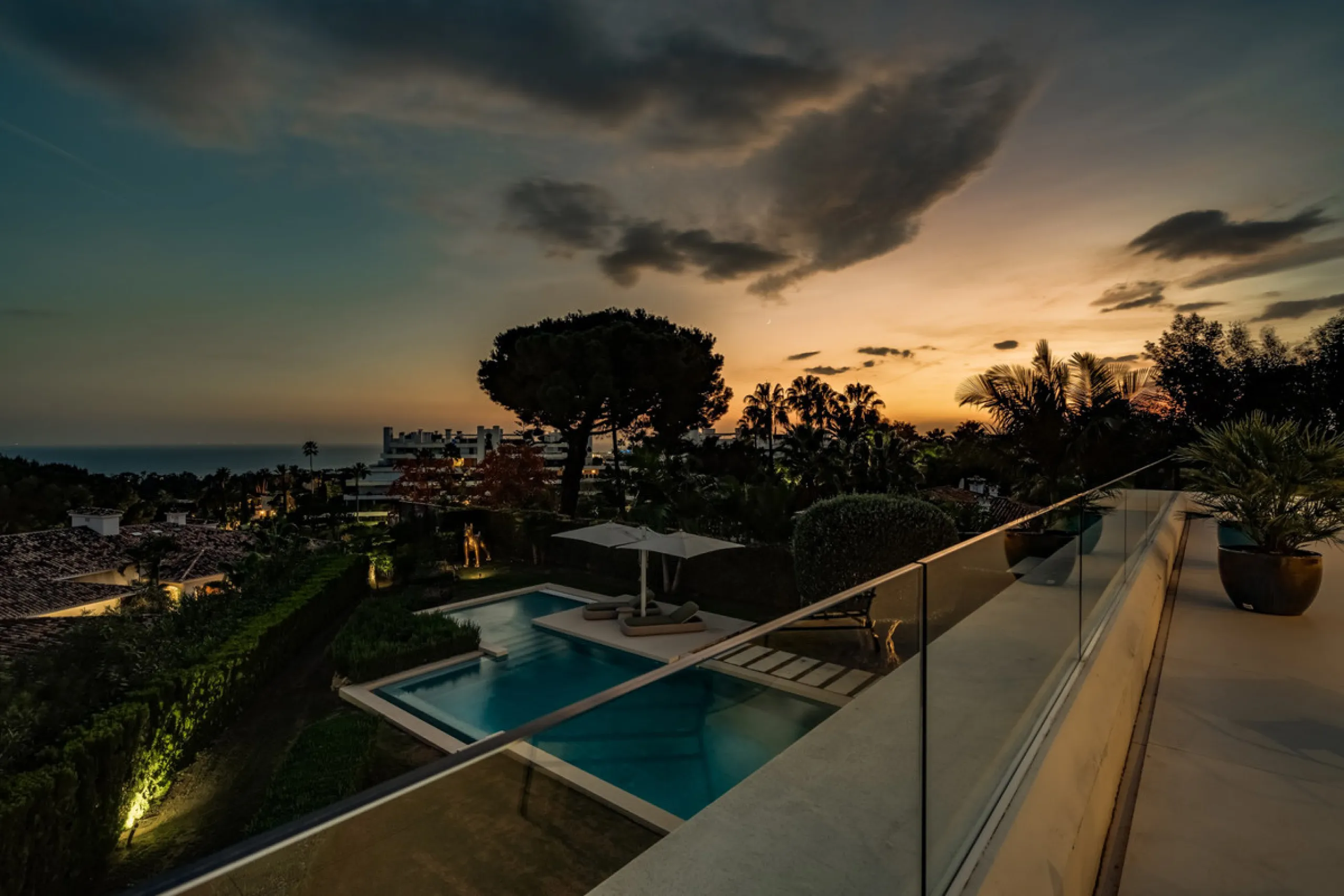 This exceptional villa is nestled within an exclusive gated community in Marbella's prestigious Golden Mile. Set on a generous south-facing plot, the property is bathed in natural sunlight and enjoys breathtaking panoramic sea views from both floors, crea