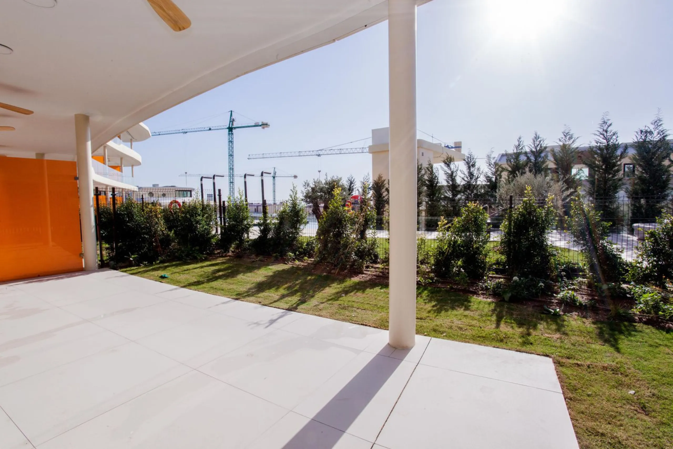 This stunning 2-bedroom ground floor apartment offers an exceptional living experience with 89 m² of constructed interior space, a 32 m² terrace, and a 73 m² private garden. Built with meticulous attention to detail, the apartment blends modern design wit
