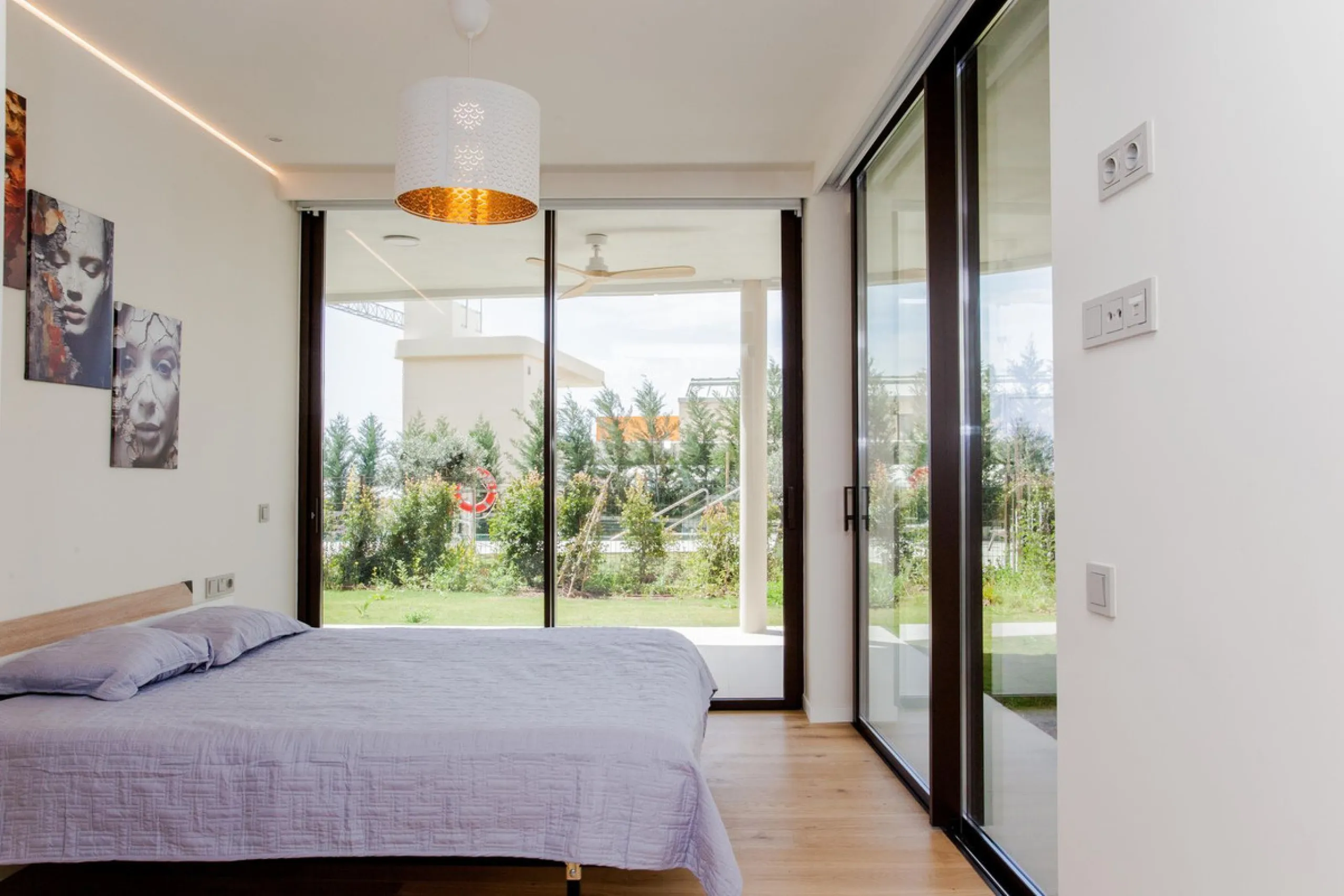 This stunning 2-bedroom ground floor apartment offers an exceptional living experience with 89 m² of constructed interior space, a 32 m² terrace, and a 73 m² private garden. Built with meticulous attention to detail, the apartment blends modern design wit