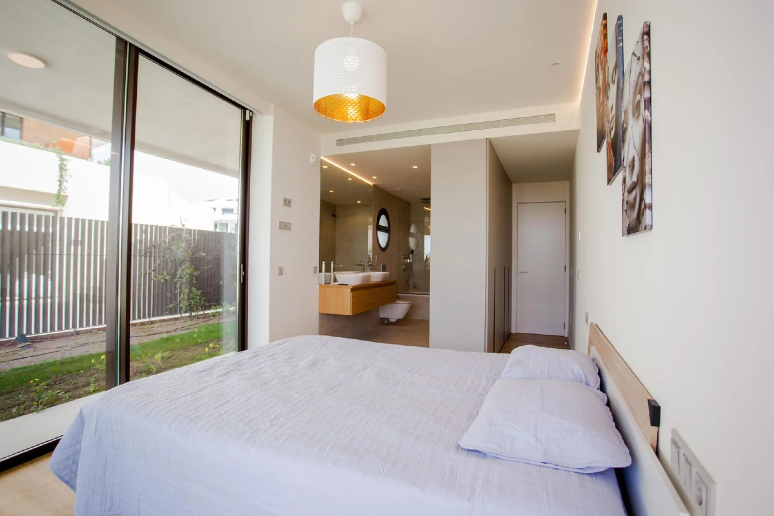 This stunning 2-bedroom ground floor apartment offers an exceptional living experience with 89 m² of constructed interior space, a 32 m² terrace, and a 73 m² private garden. Built with meticulous attention to detail, the apartment blends modern design wit